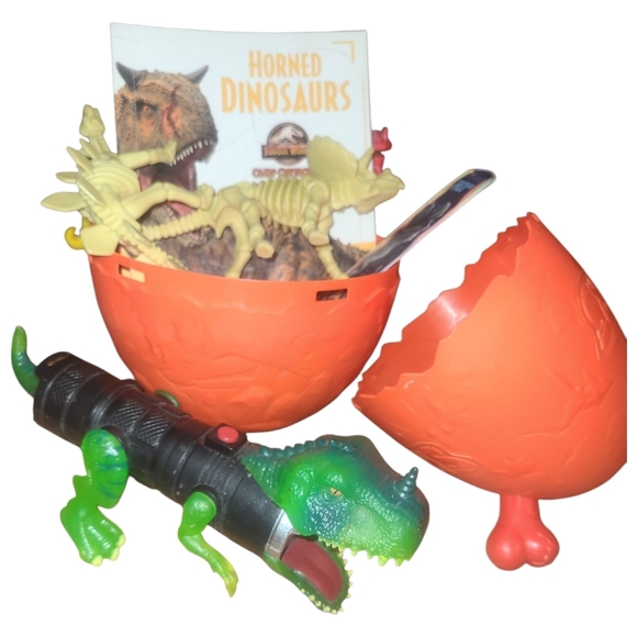 Dinosaur Egg Bundle Toy Set Flashlight, Car, Skeletins, And More! - Picture 1 of 4